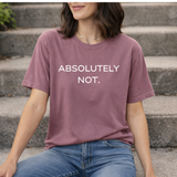 A woman wearing a berry purple t-shirt with 'ABSOLUTELY NOT.' text sitting on steps.