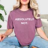 Person wearing a purple t-shirt with 'ABSOLUTELY NOT.' text, sitting on a couch.