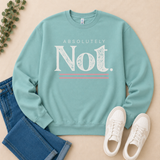 A mint green crewneck sweatshirt with a distressed white graphic reading 'ABSOLUTELY Not.' and two thin pink lines, styled in a flat lay with blue jeans, white sneakers, and a sprig of greenery on a beige background.