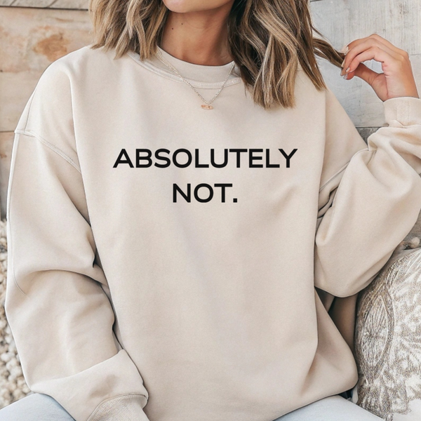 Person wearing a beige sweatshirt with 'ABSOLUTELY NOT.' text.