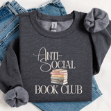 Gray sweatshirt with 'Anti-Social Book Club' text and book stack graphic on a white background