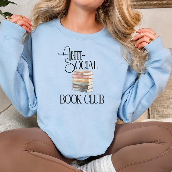 Light blue sweatshirt with 'Anti-Social Book Club' text and book graphic worn by a person.
