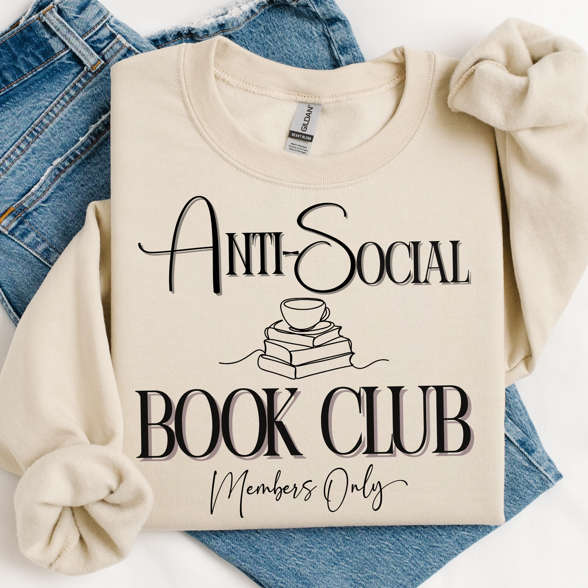 Beige sweatshirt with 'Anti-Social Book Club Members Only' text on a white background