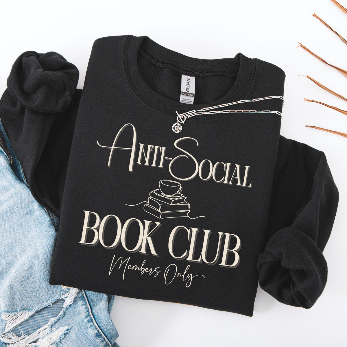 Black sweatshirt with 'Anti-Social Book Club Members Only' text on a white background