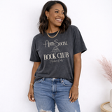 Woman wearing a 'Anti-Social Book Club' t-shirt against a white background