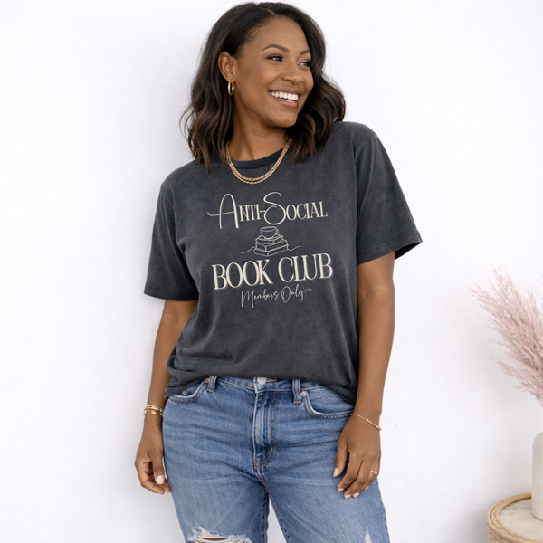Woman wearing a 'Anti-Social Book Club' t-shirt against a white background