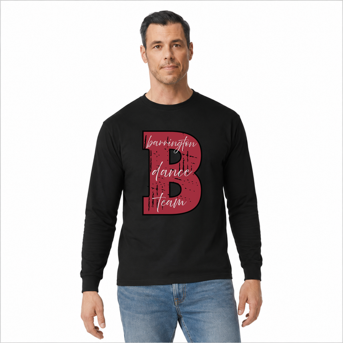 A man wearing a black long-sleeve t-shirt with a red and pink graphic of a letter 'B' and the words 'Barrington dance team' on the front, paired with blue jeans, against a plain white background.