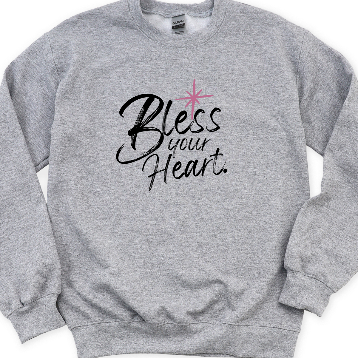 Gray sweatshirt with 'Bless your Heart' text on a white background
