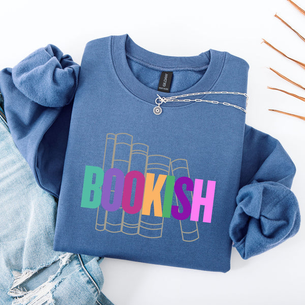 Blue sweatshirt with 'BOOKISH' multi-colored text on a white background