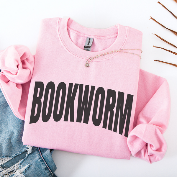 Pink sweatshirt with 'BOOKWORM' text on a white background