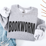 Gray folded sweatshirt with 'BOOKWORM' text on a white background