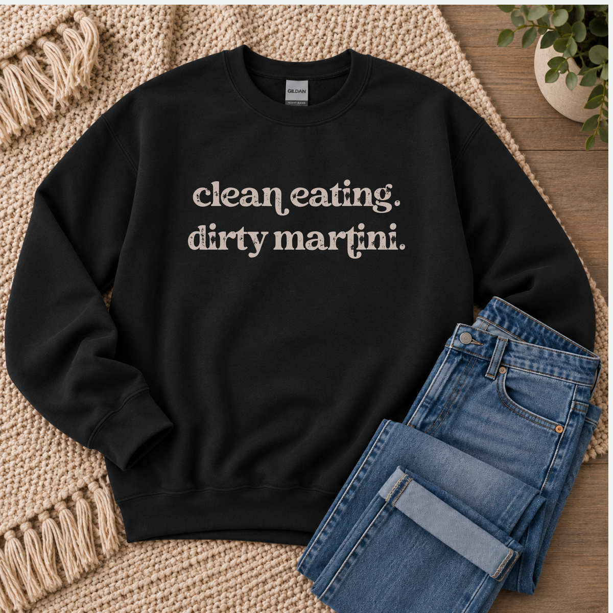 A black crewneck sweatshirt with the text 'clean eating. dirty martini.