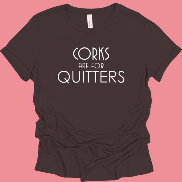 Black t-shirt with 'Corks are for Quitters' text on a pink background