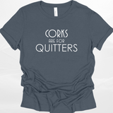 Navy Blue t-shirt with white text 'Corks are for Quitters' on a light gray background