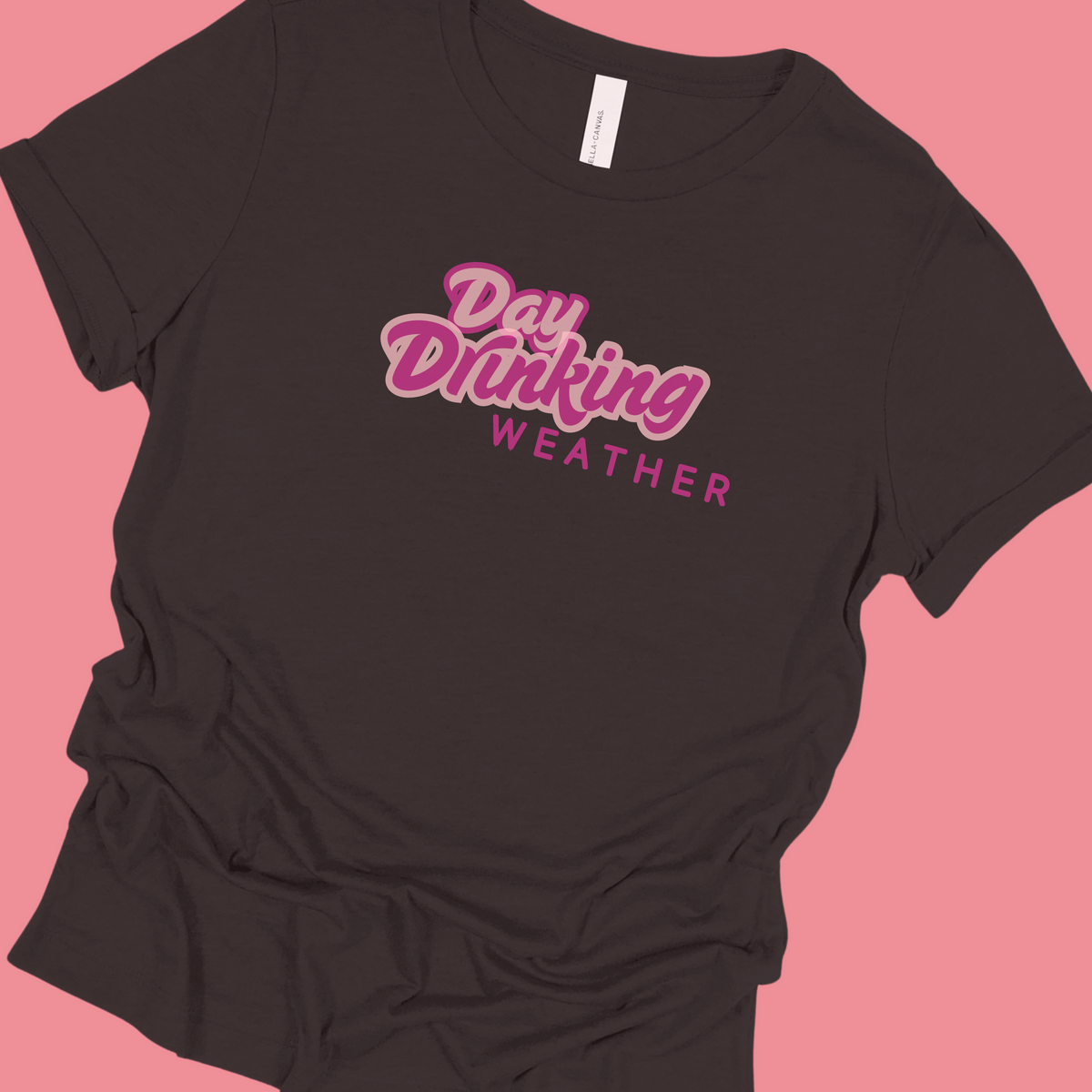 Black T-shirt with "Day Drinking Weather" written in bright pink font.