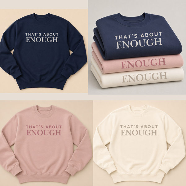 Four sweatshirts with the text 'THAT'S ABOUT ENOUGH' printed across the chest, shown in navy, pink, cream, and light beige. The top-left sweatshirt is laid flat, while the other three are stacked or laid flat in a clean, multi-color product presentation.