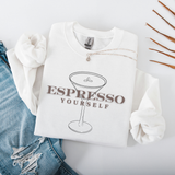 White sweatshirt with 'Espresso Yourself' text and espresso cup graphic on a light gray background.