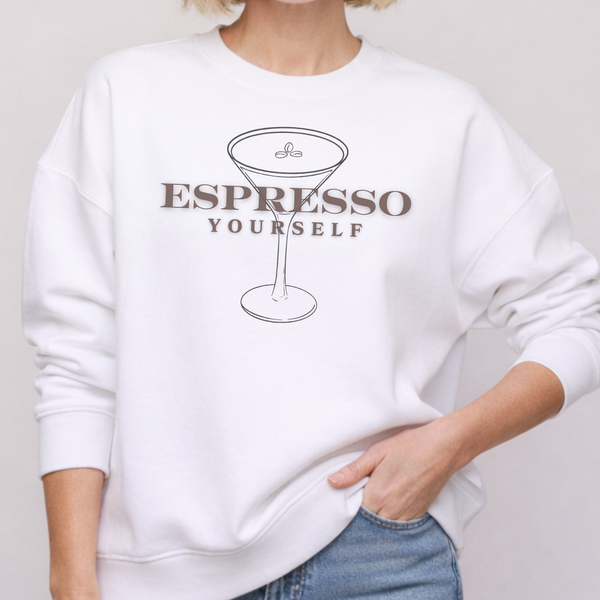 White sweatshirt with 'Espresso Yourself' text and martini glass graphic on a plain background