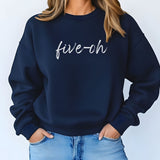 Navy blue sweatshirt with 'five-oh' text worn by a woman against a white background wearing jeans.