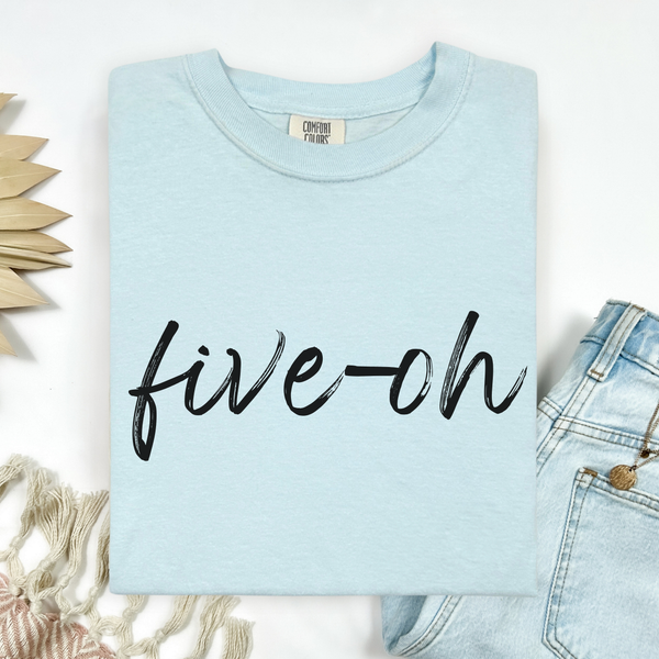 Light blue tee shirt with 'five oh' text on a white background