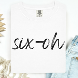 White t-shirt with 'six-oh' text on a white background