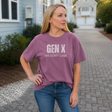A woman standing outside in a berry tee shirt on that says 
