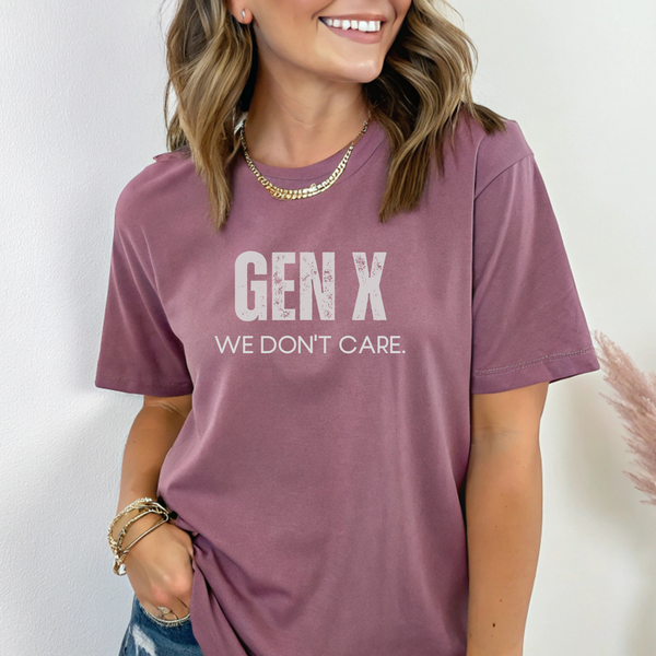 Person wearing a purple t-shirt with 'GEN X WE DON'T CARE' text against a white background