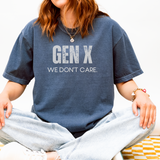 Person wearing a blue t-shirt with 'GEN X WE DON'T CARE' text.