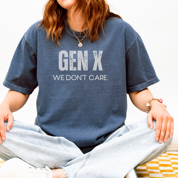 Person wearing a blue t-shirt with 'GEN X WE DON'T CARE' text.