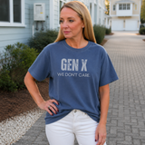 A woman standing outside in a navy blue tee shirt on that says 
