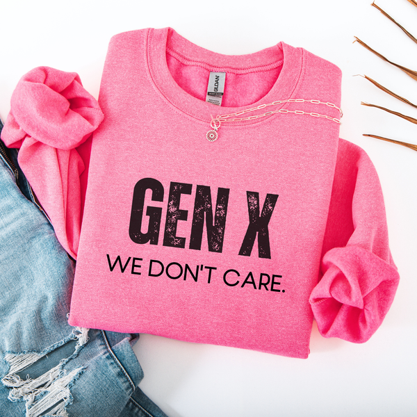 Pink sweatshirt with 'GEN X WE DON'T CARE' text on a white background