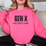Woman sitting in bright pink sweatshirt with 
