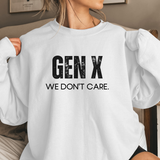 White sweatshirt with 'GEN X WE DON'T CARE' text worn by a person.