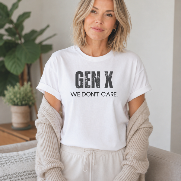 A woman standing in a white tee shirt on that says "Gen X: We Don't Care."