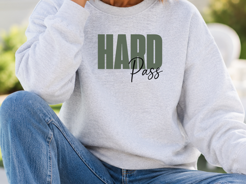Woman in a an ash gray sweatshirt that says 