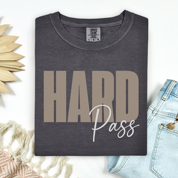 Dark gray t-shirt with 'HARD Pass' text on a light background