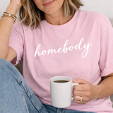 A woman in a pink tee shirt with 