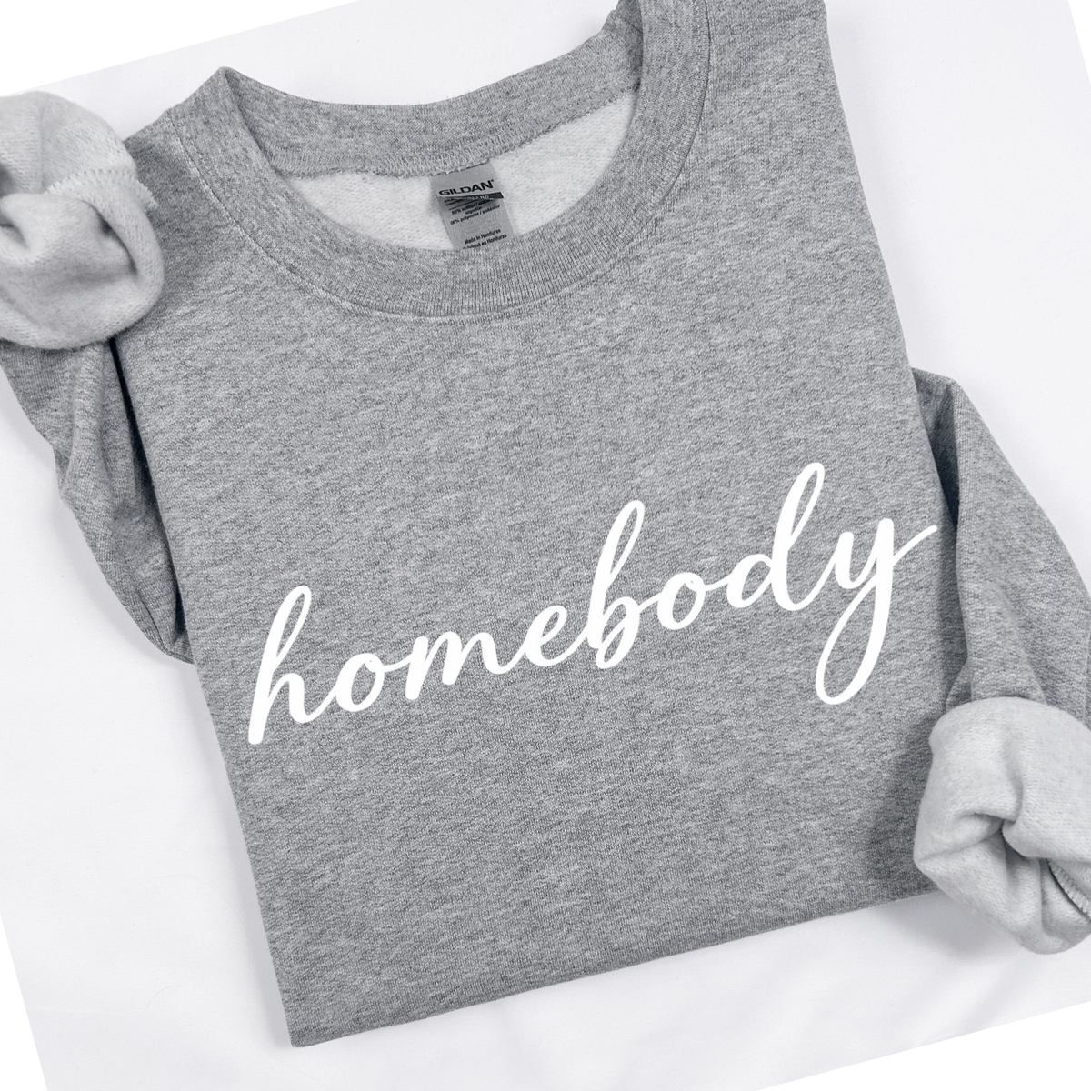 Graphite Gray sweatshirt with 'homebody' text on a white background