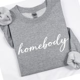 Graphite Gray sweatshirt with 'homebody' text on a white background