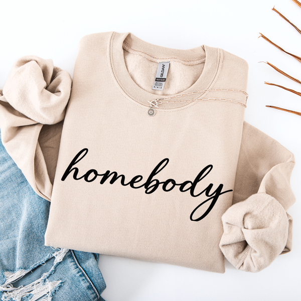 Sand Beige sweatshirt with 'homebody' text on a white background