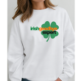 White sweatshirt with a green four-leaf clover graphic and text 'irish goodbye expert' on a plain background