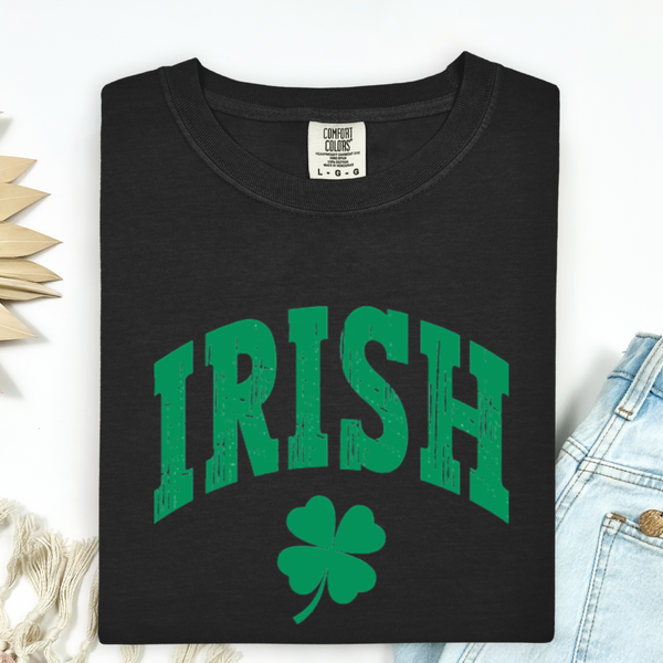 Black t-shirt with green 'IRISH' text and clover leaf design on a white background