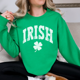Person wearing a green sweatshirt with 'IRISH' and a clover design.