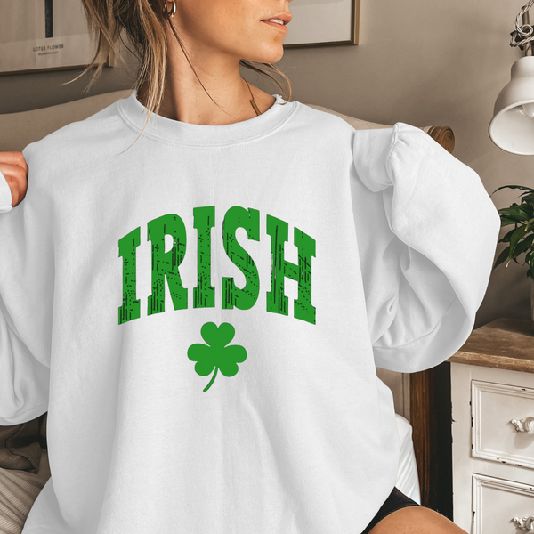 White sweatshirt with "Irish" written in green with a shamrock underneath.
