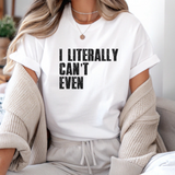 Person wearing a white t-shirt with text sitting on a couch.