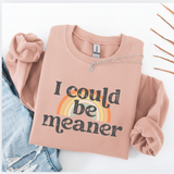 Pink sweatshirt with 'I could be meaner' text and rainbow design on a white background