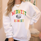 White sweatshirt with 'Midwest is Best' text in colorful letters worn by a person.
