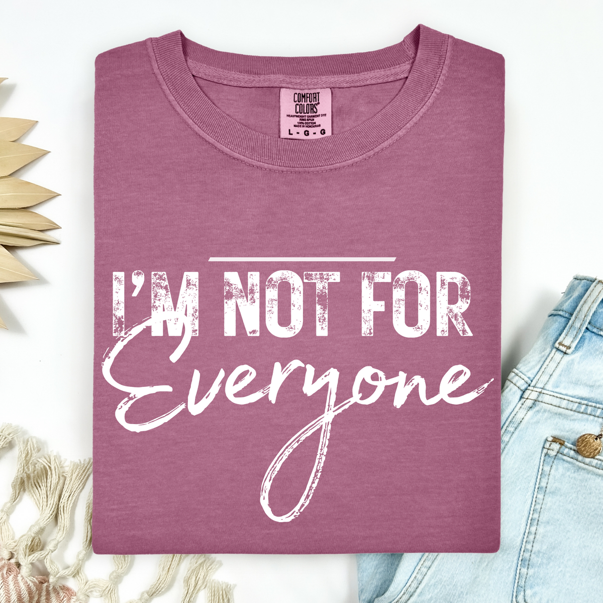Mauve t-shirt with 'I'm not for everyone' text on a white background