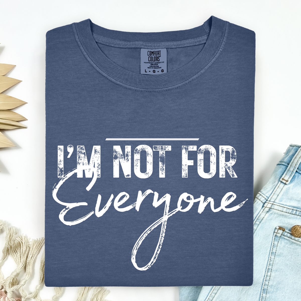 Navy blue t-shirt with 'I'm not for everyone' text on a light background