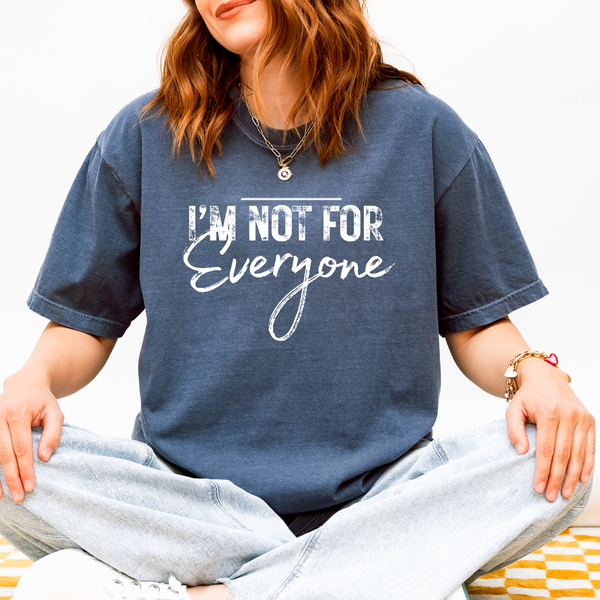 Person wearing a blue t-shirt with 'I'm Not For Everyone' text.
